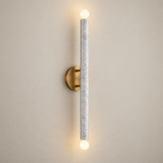 Callaway Minimalist Marble Wall Sconce on a warm greige background; White grey marble vertical rod, burnished brass wall mount
