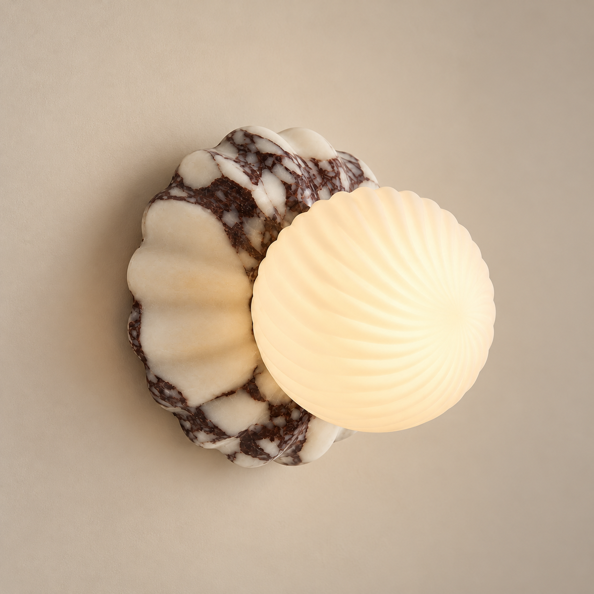 Verdessa Marble Globe Wall Sconce on a warm greige background; Purple white scalloped marble, spiral fluted glass globe
