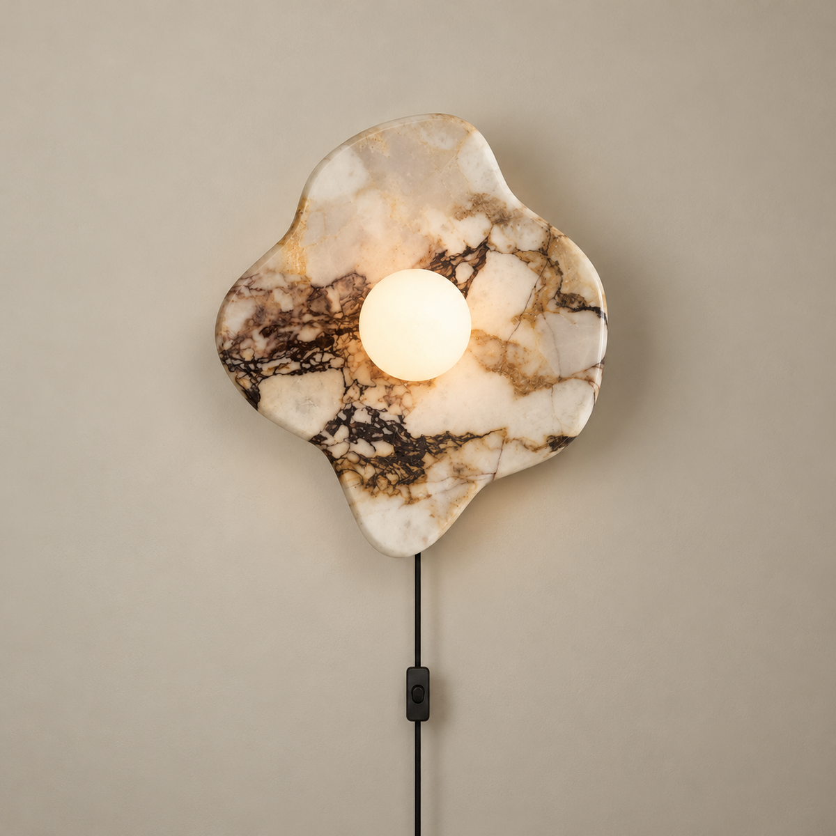 Abnormal Free-Form Marble Globe Wall Sconce on a warm greige background; Calacatta purple plug in free form wall sconce