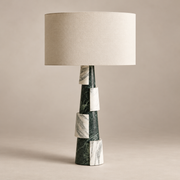 Misha Marble Table Lamp with Fabric Shade on a warm greige background; Green and white stacked marble base table lamp