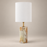 Maricopa Traditional Stone Table Lamp on a warm greige background; Cyan onyx cylinder base with tall white drum shade