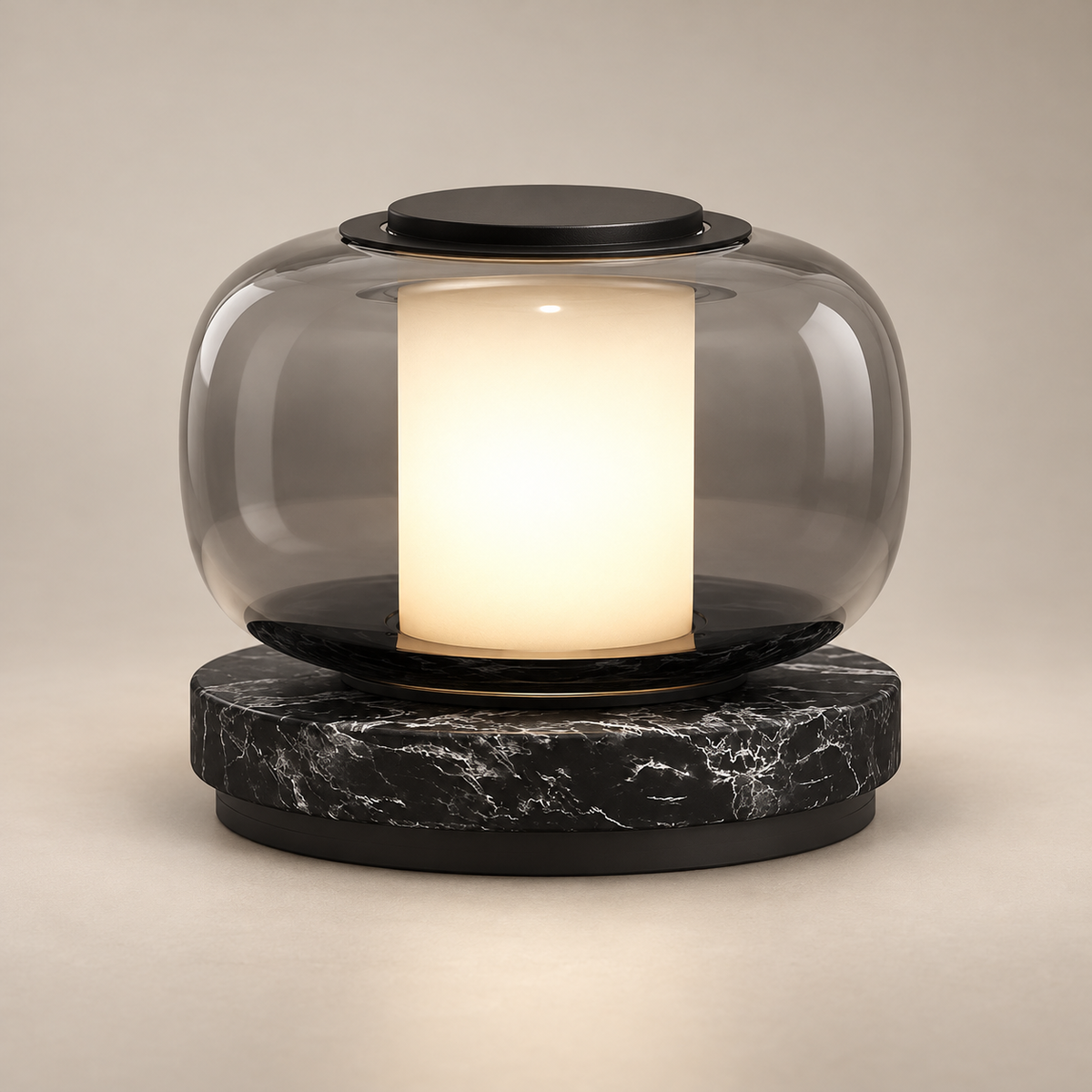 Luna A Marble LED Table Lamp on a warm greige background; Smoke gray glass and black marble LED table lamp