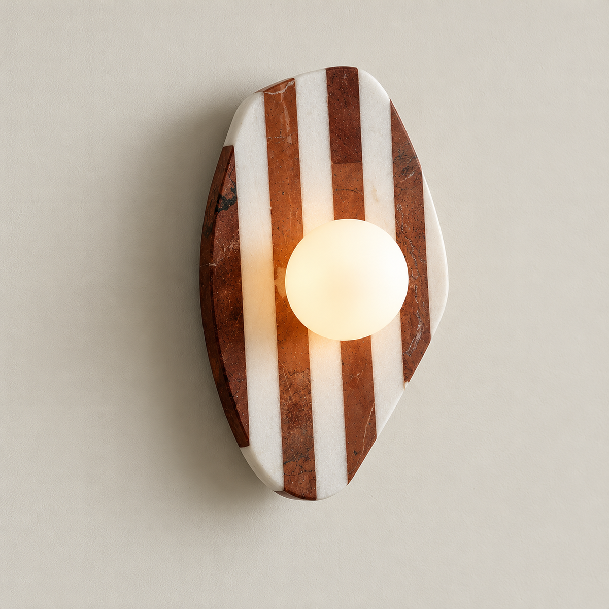 Camden Striped Marble Wall Sconce on a warm greige background; Red white striped organic marble wall sconce
