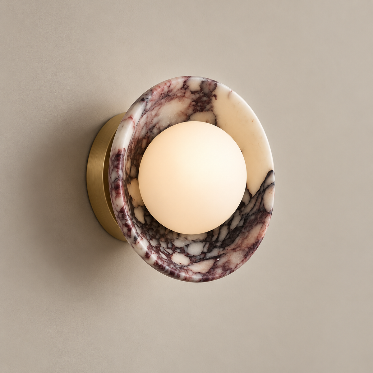 Avelune Organic Modern Marble Wall Sconce on a warm greige background