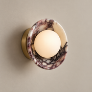 Avelune Organic Modern Marble Wall Sconce on a warm greige background