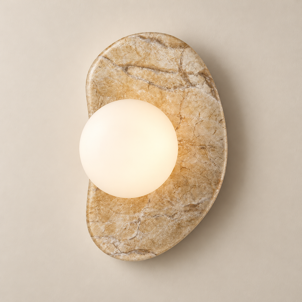 Petriva Marble Globe Wall Sconce on a warm greige background