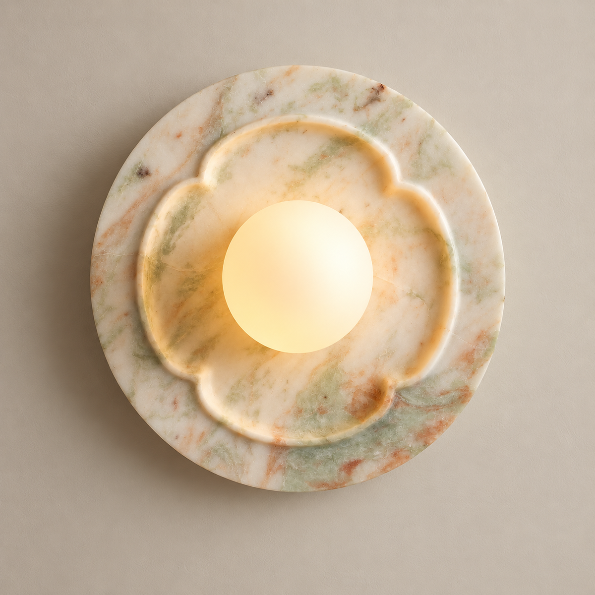 Camellia Organic Modern Marble Wall Sconce on a warm greige background