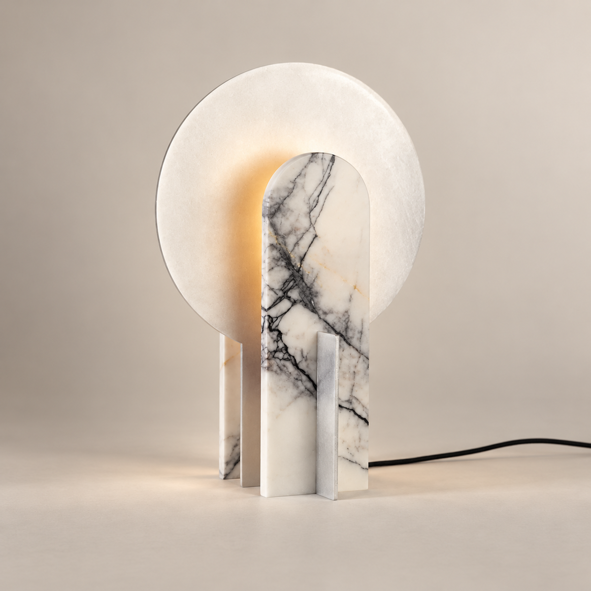 Alice Marble LED Table Lamp on a warm greige background; White marble arch and circular halo table lamp