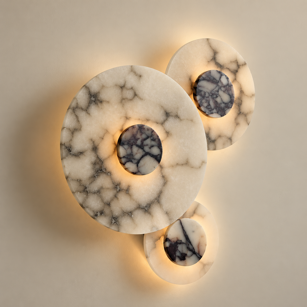 Median Combination Alabaster LED Wall Sconce on a warm greige background; Three alabaster disk combination wall lamp