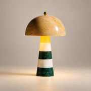 Hed Art Deco Marble Table Lamp on a warm greige background; Yellow dome / green-white striped marble stem