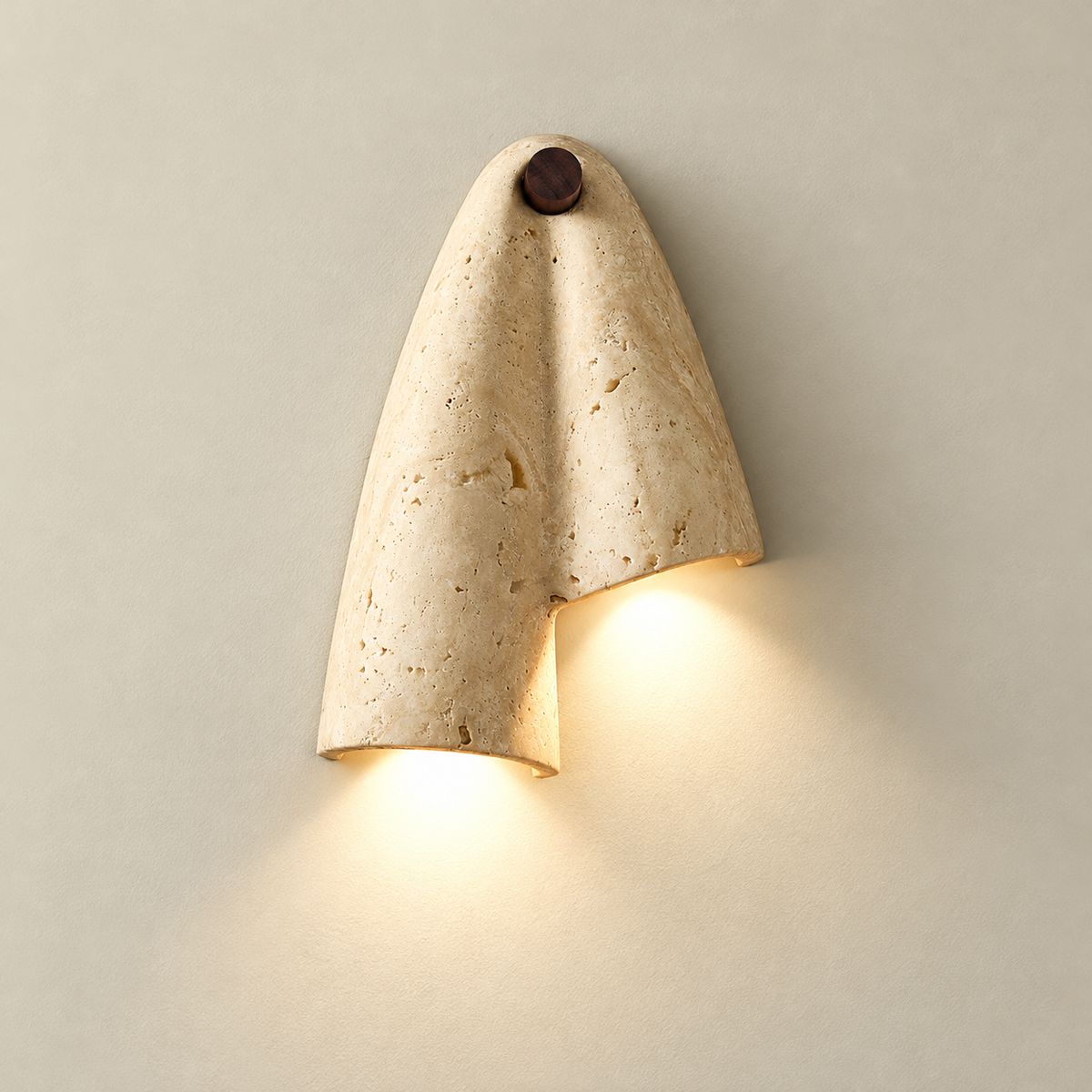 Pearlmont Japandi Travertine Wall Sconce on a warm greige background; Beige / left longer downward orientation