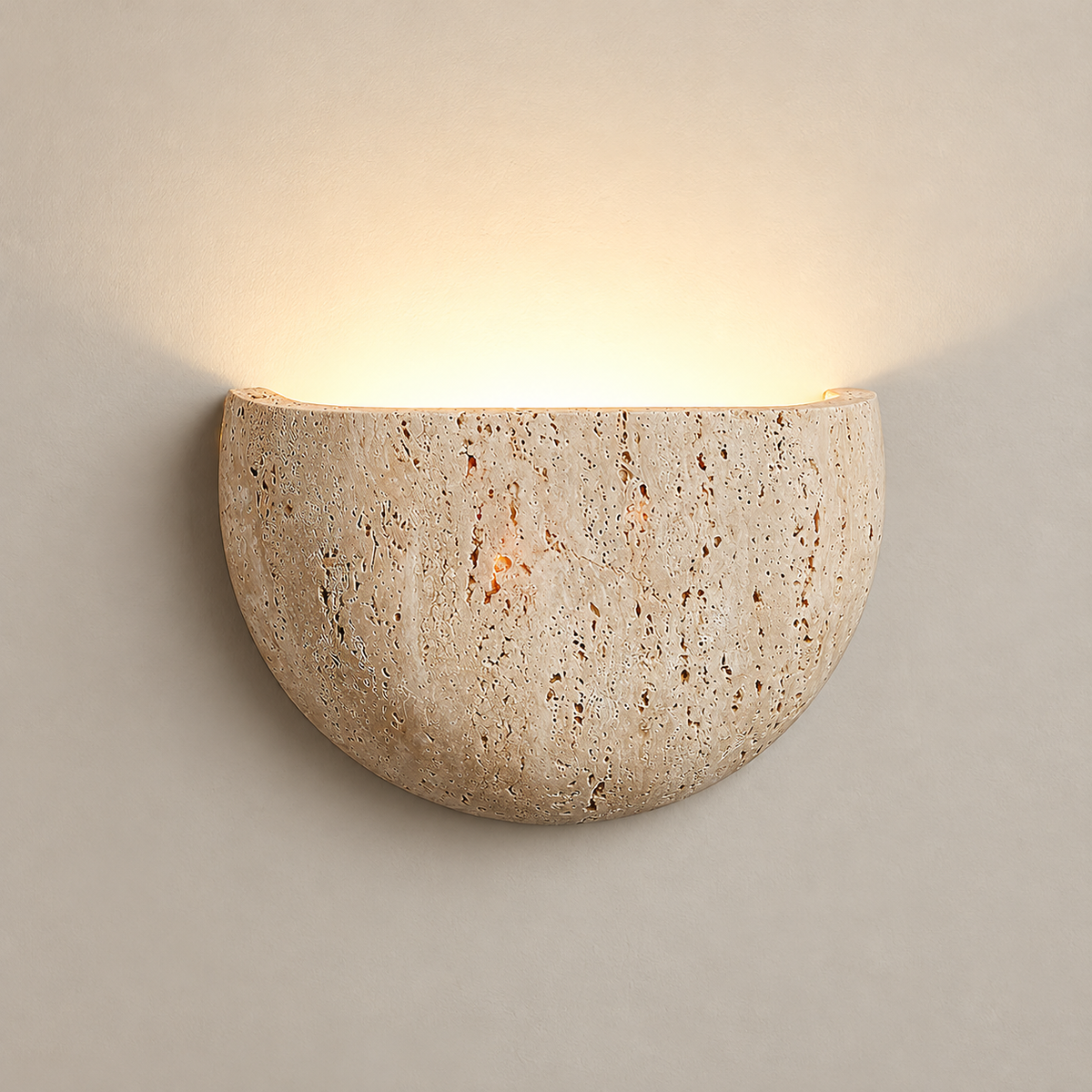 Half Moon Travertine Wall Sconce on a warm greige background; Beige travertine