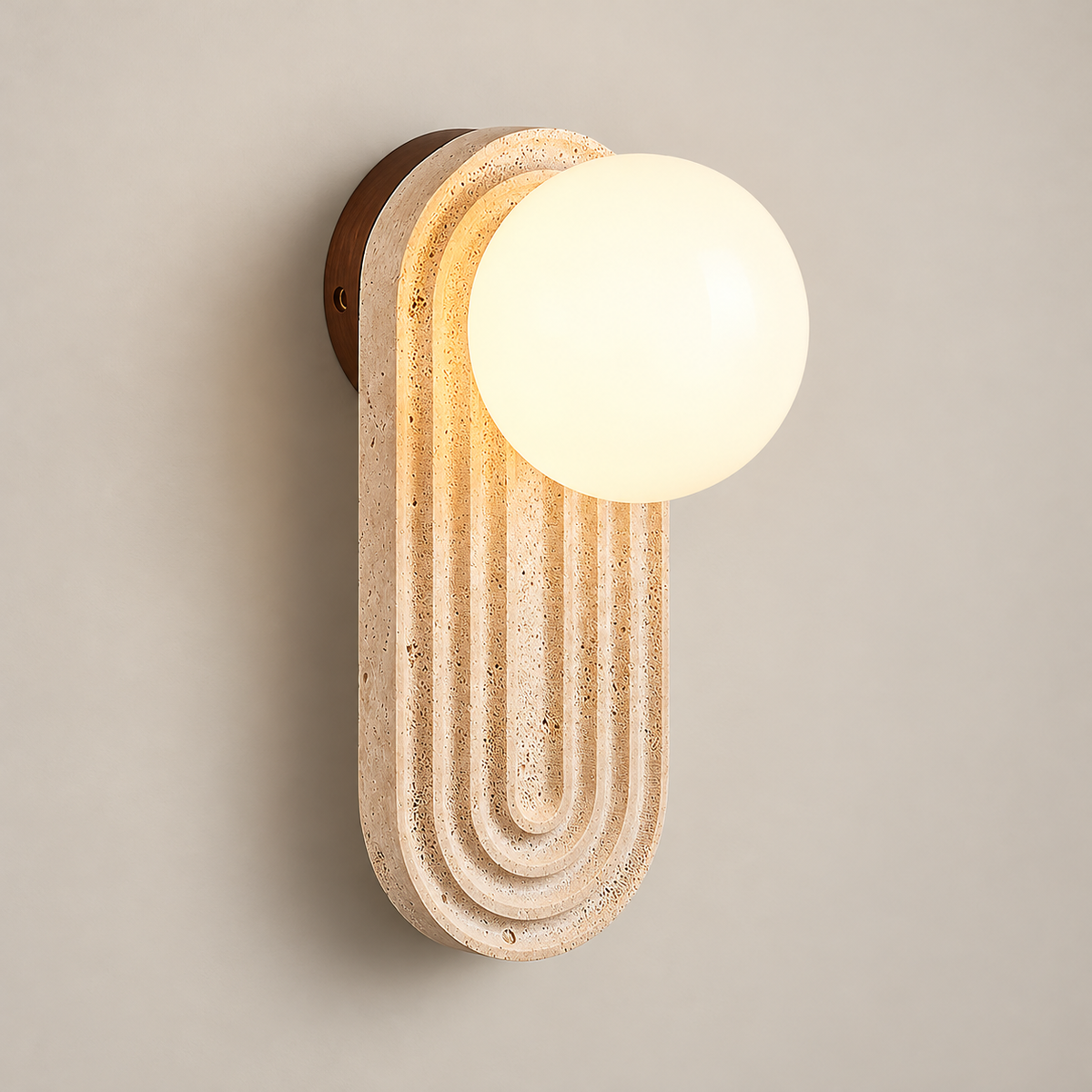 Trent Japandi Travertine Wall Sconce on a warm greige background; Beige