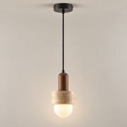 Davise Travertine Globe Pendant Light on a warm greige background; Walnut & Beige