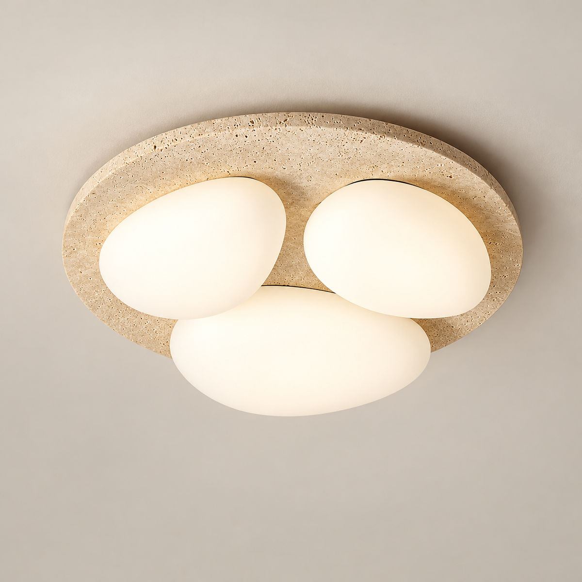 Glaze Travertine LED Ceiling Light on a warm greige background; Beige & White / three diffusers