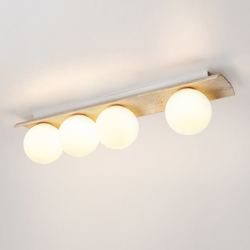 Bianca Globe Travertine Ceiling Light — 4 heads L 80cm x W 16cm x H 20cm / L 31.5″ x W 6.3″ x H 7.9″; Beige & White glass