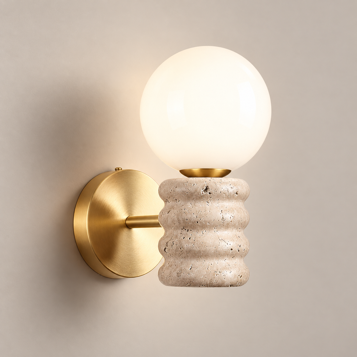 Bibi Travertine Wall Sconce on a warm greige background; Beige & Copper