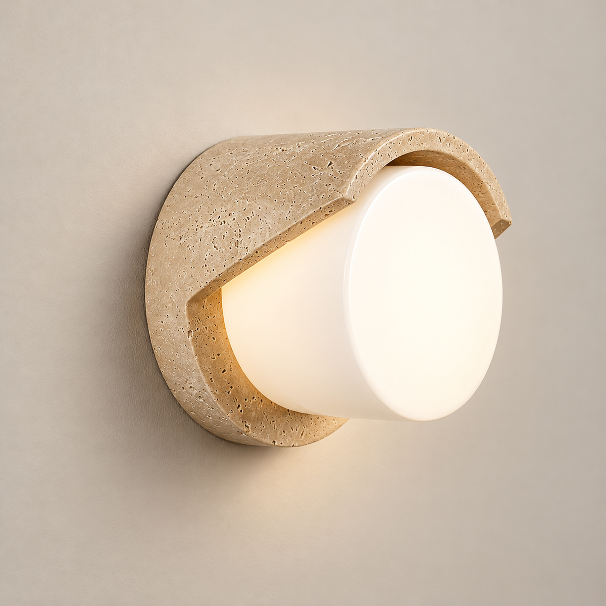 Wilma Travertine Wall Sconce on a warm greige background; Beige & White glass