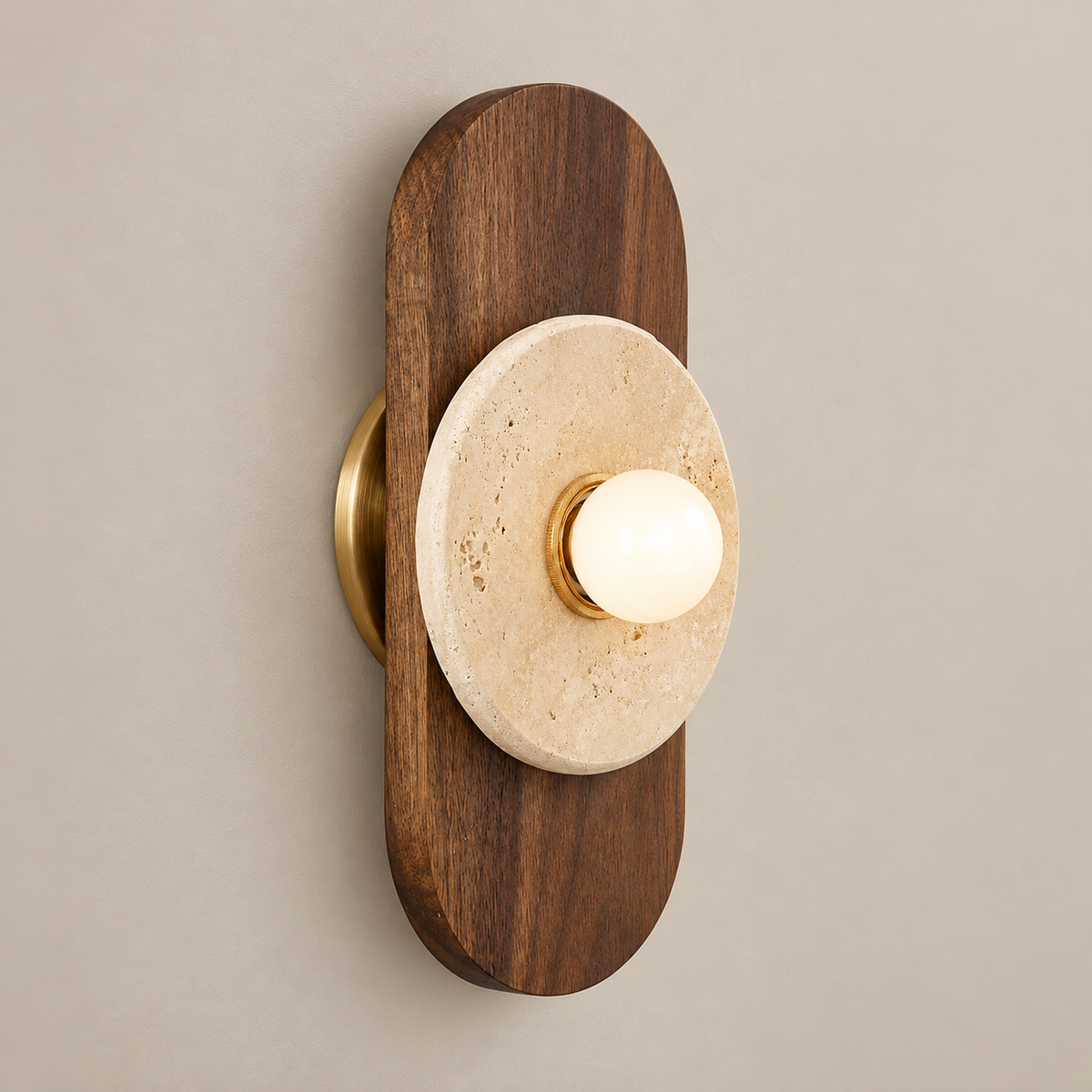 Horizon Japandi Travertine Wall Sconce on a warm greige background; Walnut capsule beige disk