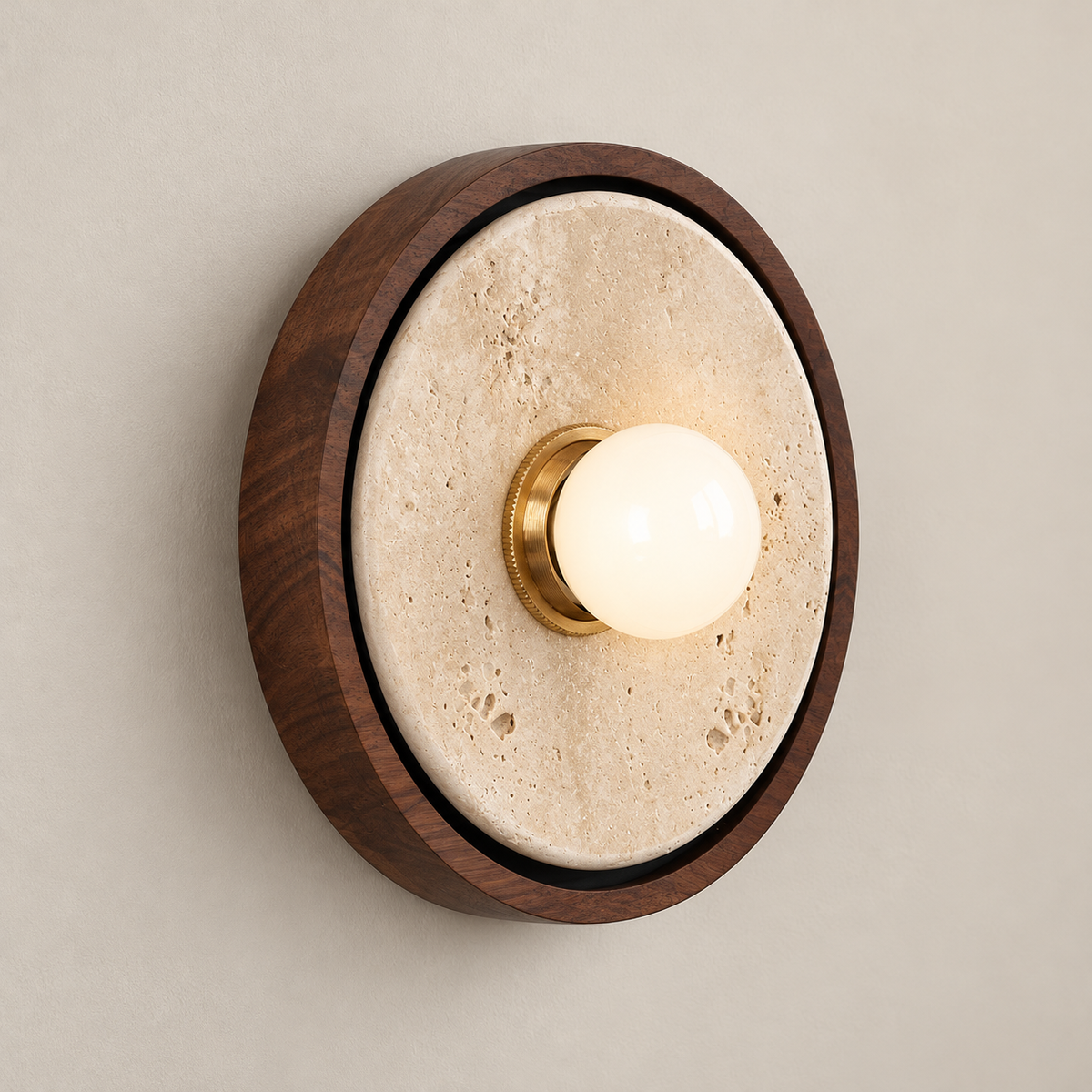 Dario Japandi Travertine Wall Sconce on a warm greige background; Walnut circular rim beige disk