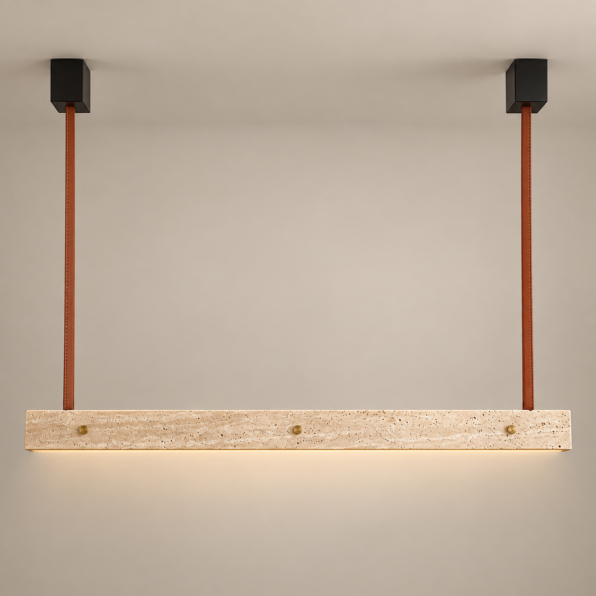 Tile Linear Travertine LED Pendant Light on a warm greige background; Beige linear bar cognac leather suspension