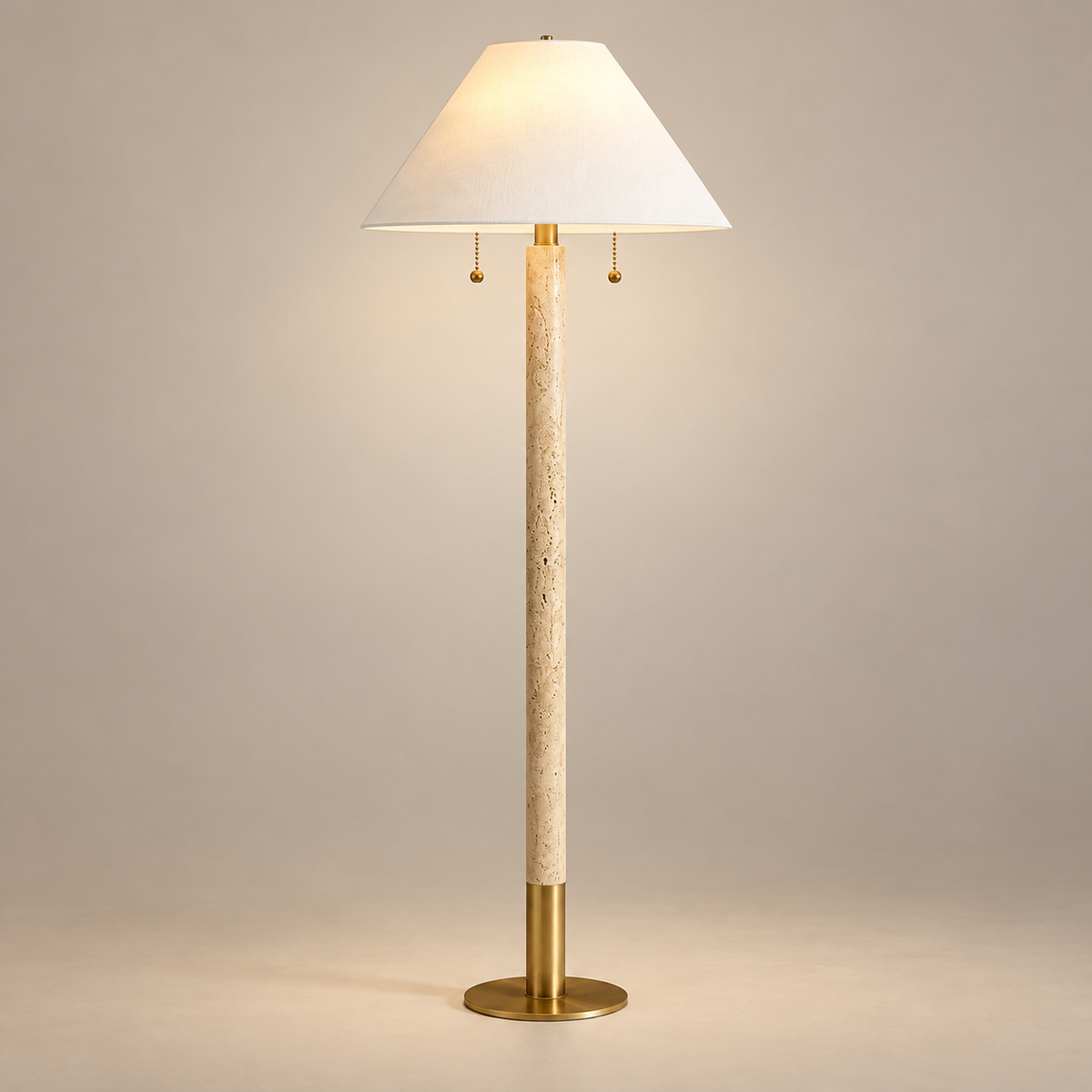 Sterling Japandi Travertine Floor Lamp on a warm greige background; White cone shade slender stone brass floor lamp