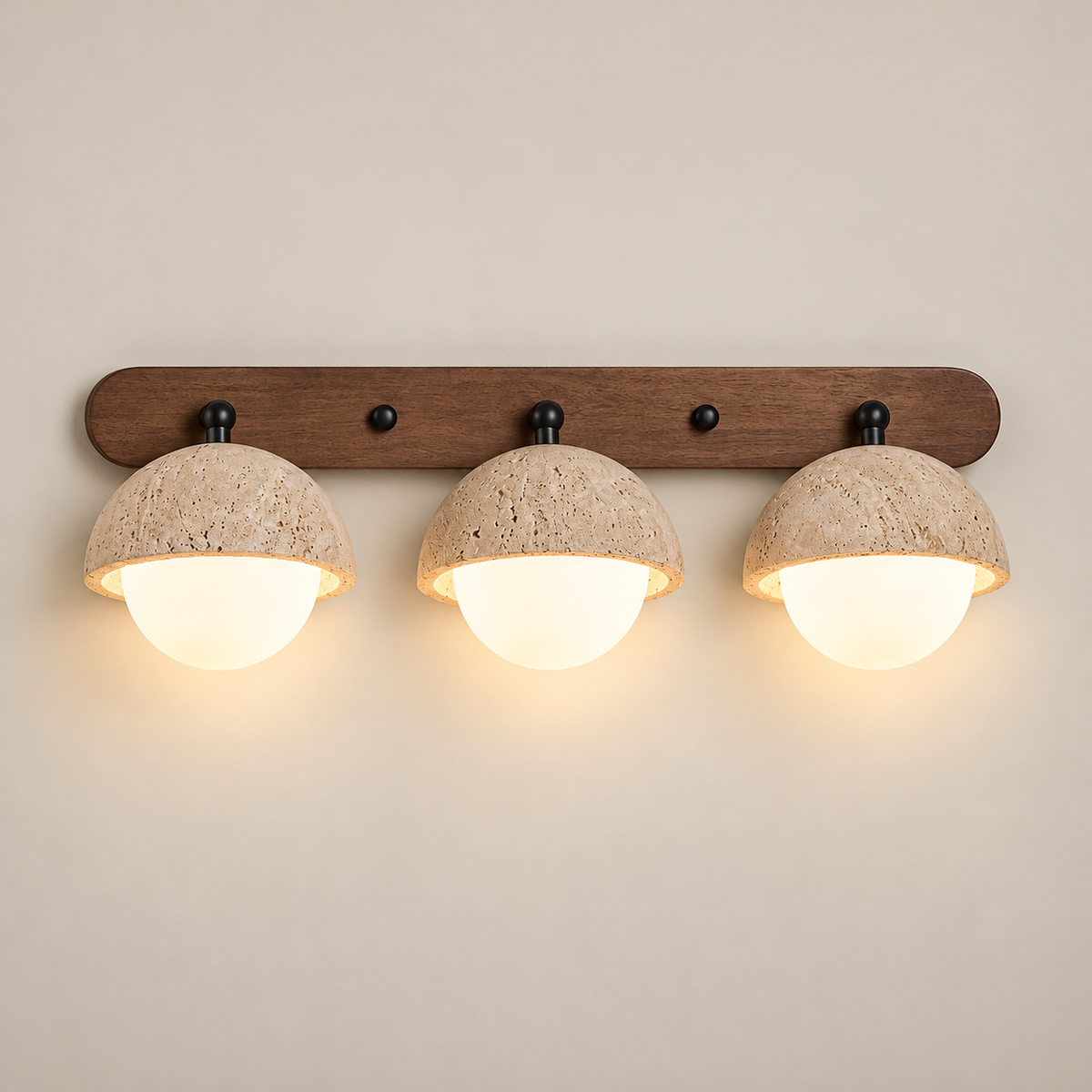 Pecherna Travertine Wall Sconce on a warm greige background; Three head walnut bar beige domes white globes