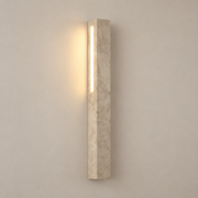 Fini Travertine LED Wall Sconce on a warm greige background; Beige / 50 cm