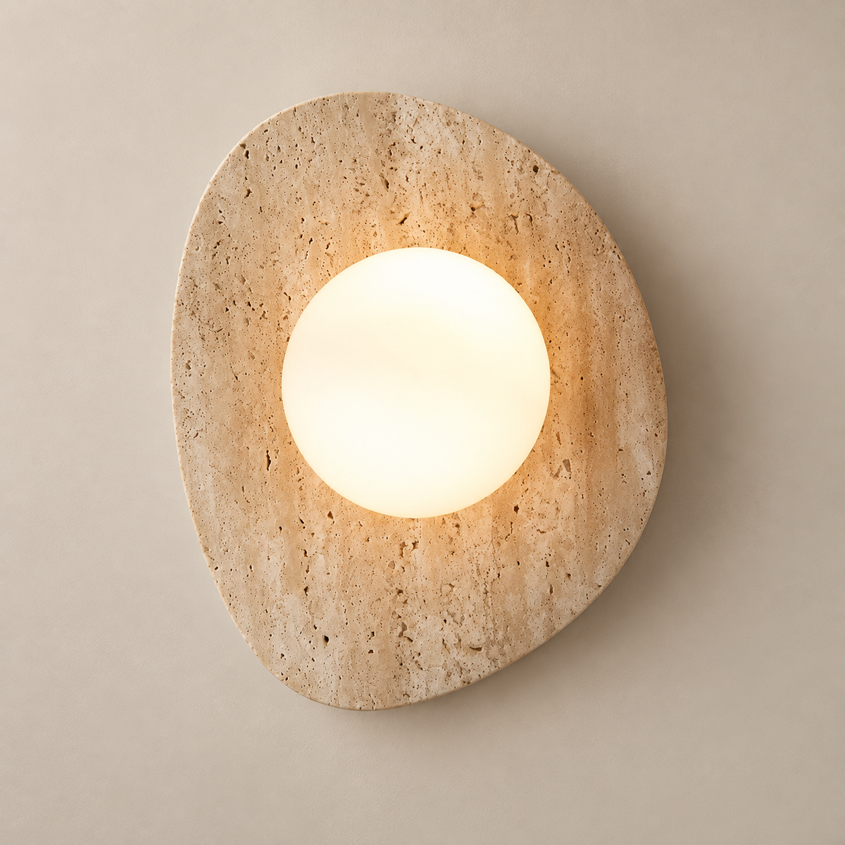 Santo Travertine Wall Sconce on a warm greige background; Beige / 30 cm