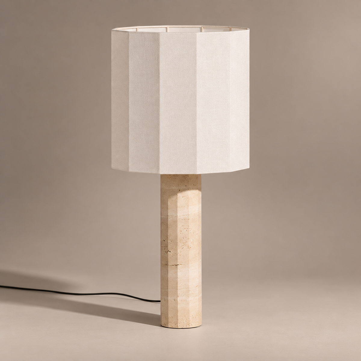 Roma Dodecagon Large Travertine Table Lamp on a warm greige background; Roma large / white dodecagon shade / beige column