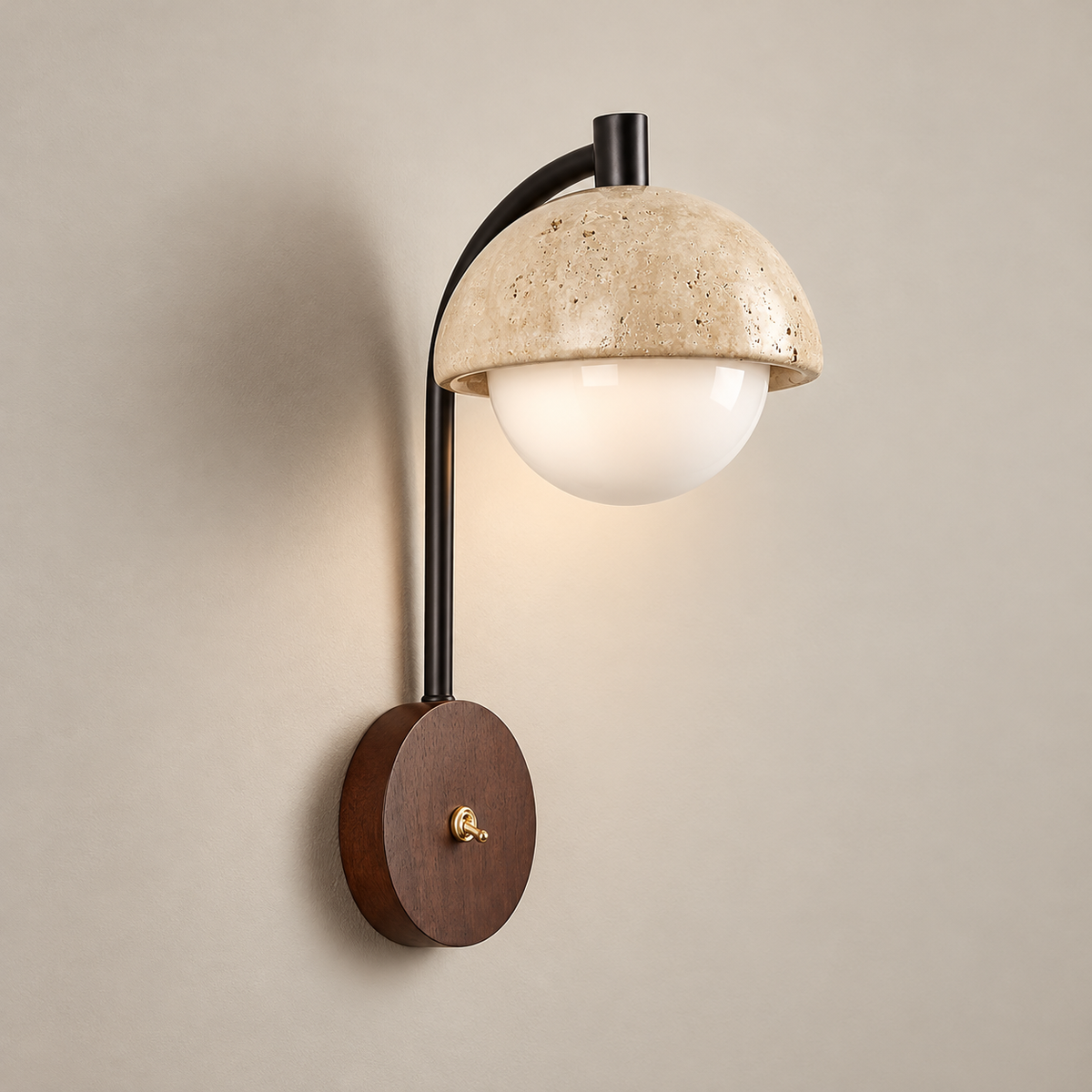 Wella Travertine Wall Sconce on a warm greige background; Wella walnut plate / black curved arm / beige dome