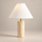 Navagio Japandi Travertine Table Lamp on a warm greige background; Navagio beige cylinder / wide white cone shade