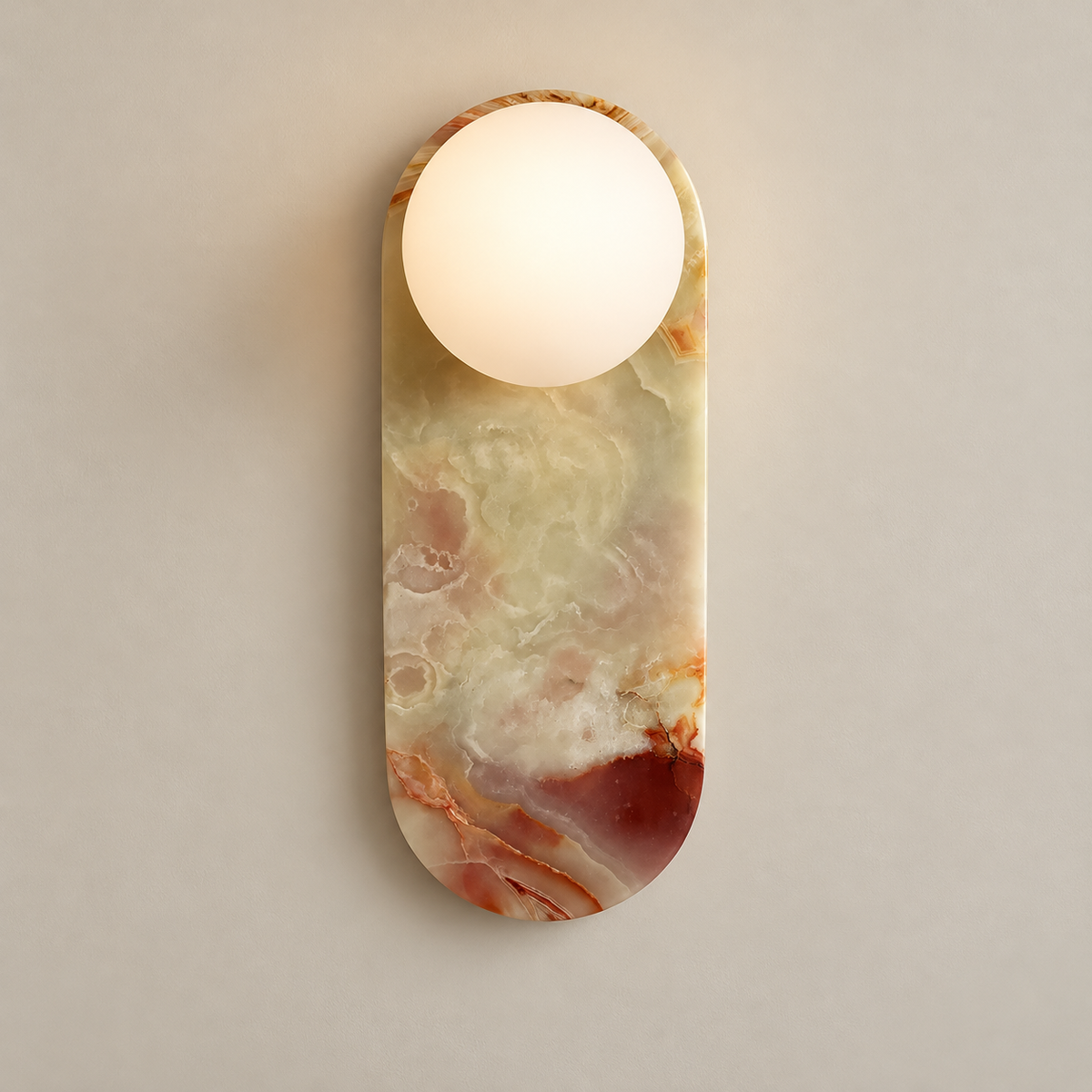 Lucie Organic Modern Cyan Onyx Wall Sconce on a warm greige background; Cyan onyx with red brown lower patch