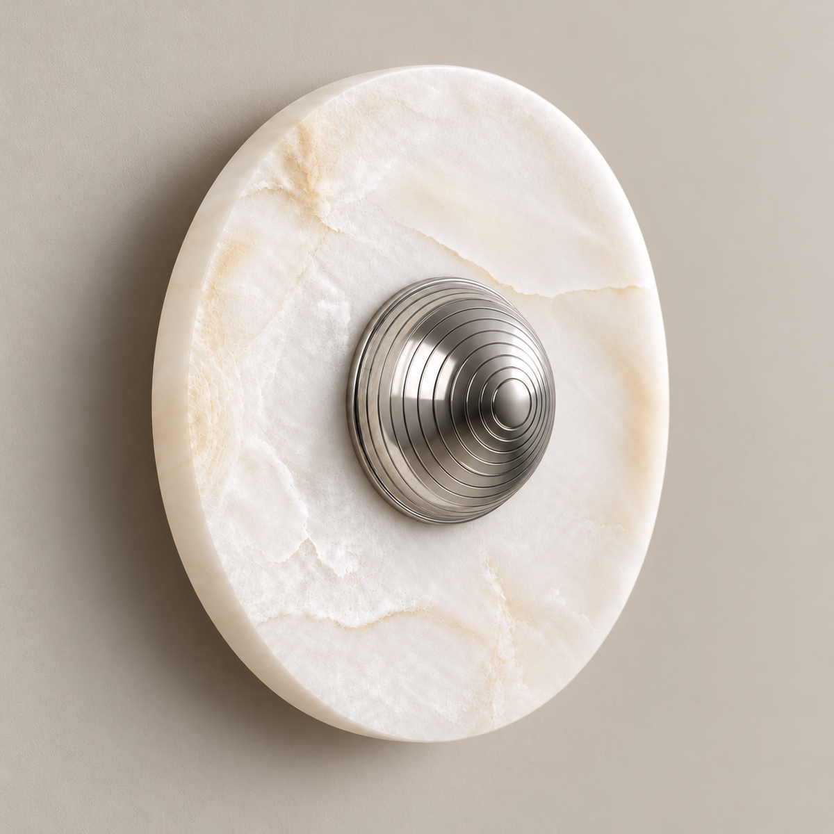 White onyx wall sconce with raised polished nickel cap and fine concentric grooves
