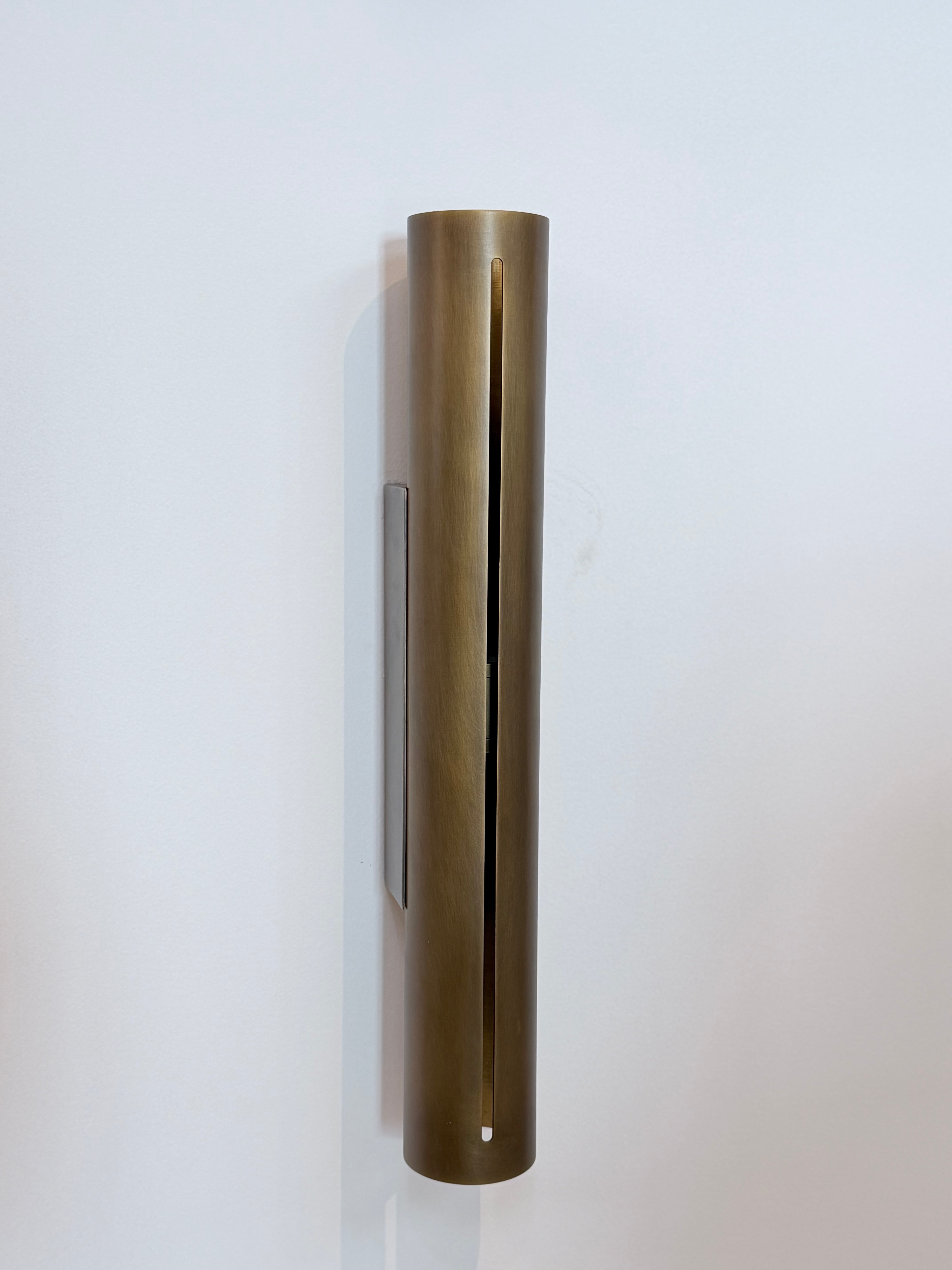 Minimalist Brass Cylinder Wall Sconce in Antique Brass