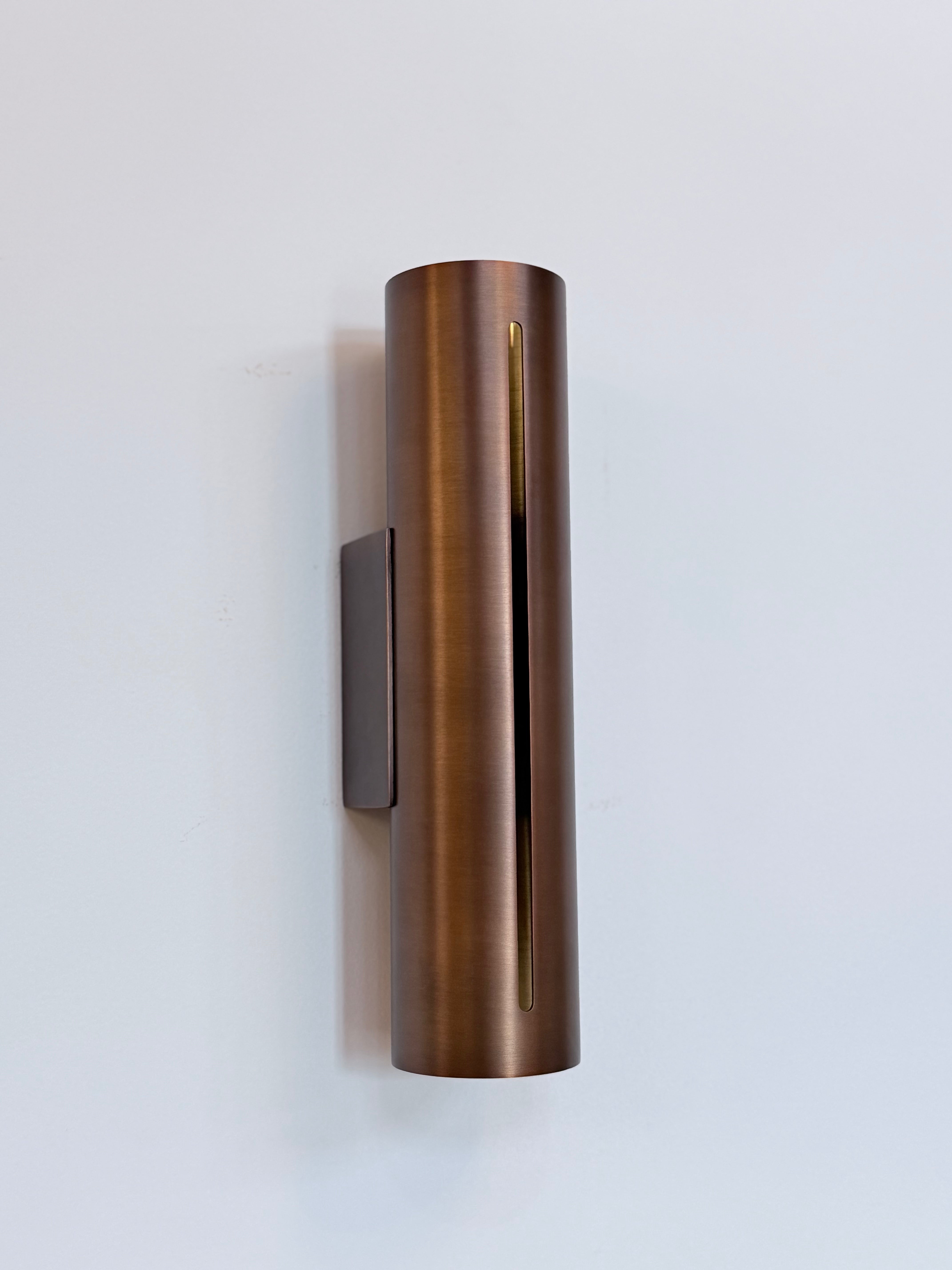 Minimalist Brass Cylinder Wall Sconce in Antique Brass