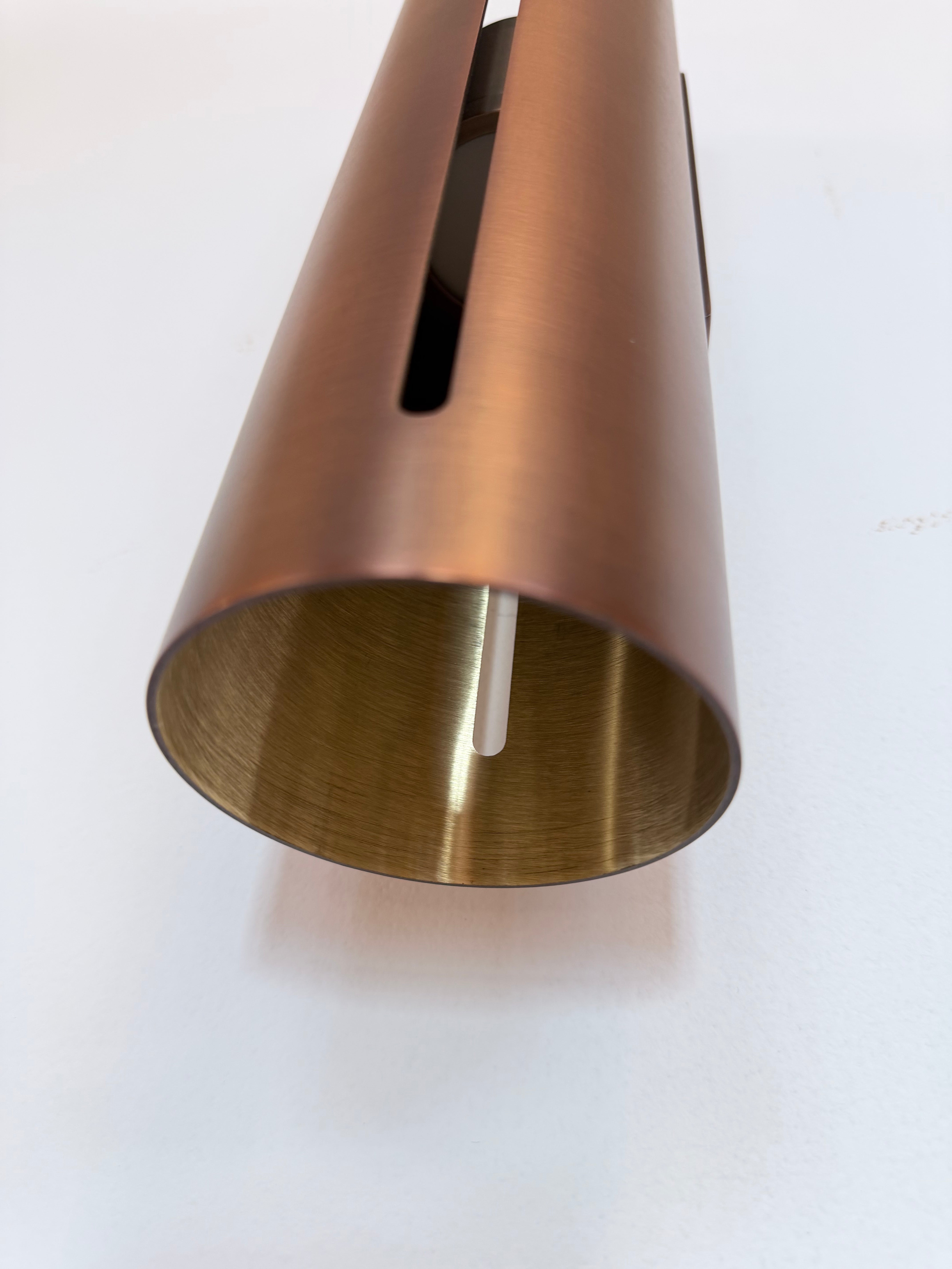 Minimalist Brass Cylinder Wall Sconce in Antique Brass