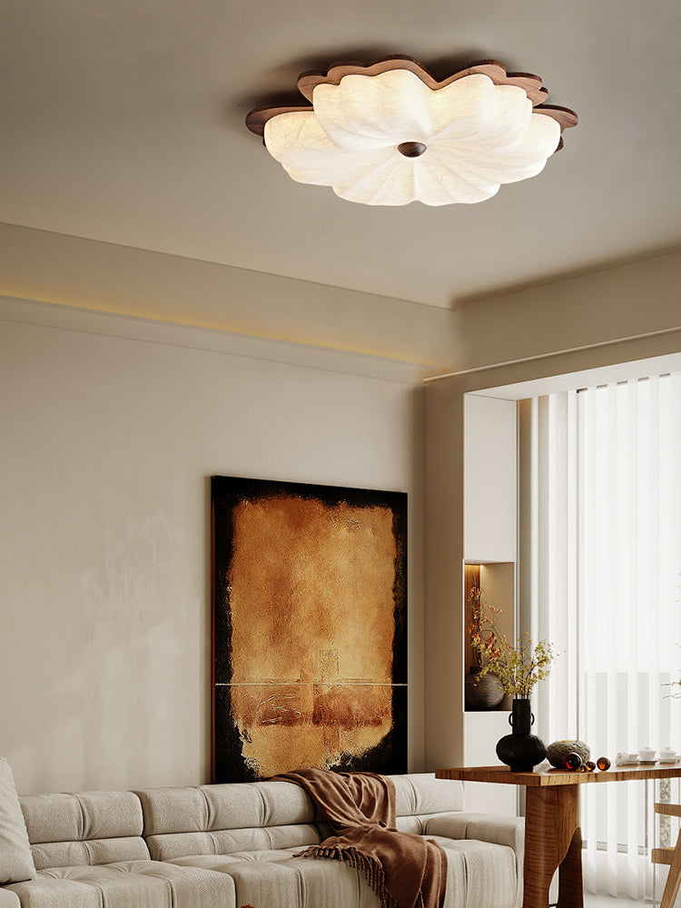 Mulberry silk flower ceiling light with walnut trim in a living room