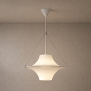 White acrylic saucer pendant with complete canopy and suspension against a warm taupe wall