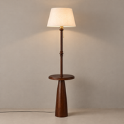 Ornvale - Plain woven-shade ash wood floor lamp with round tray, warmly lit on a taupe floor