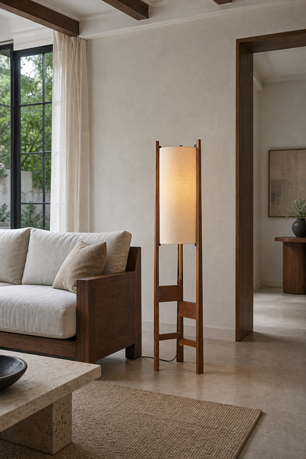 Ashverelle ash wood floor lamp — living setting, warm-lit lamp