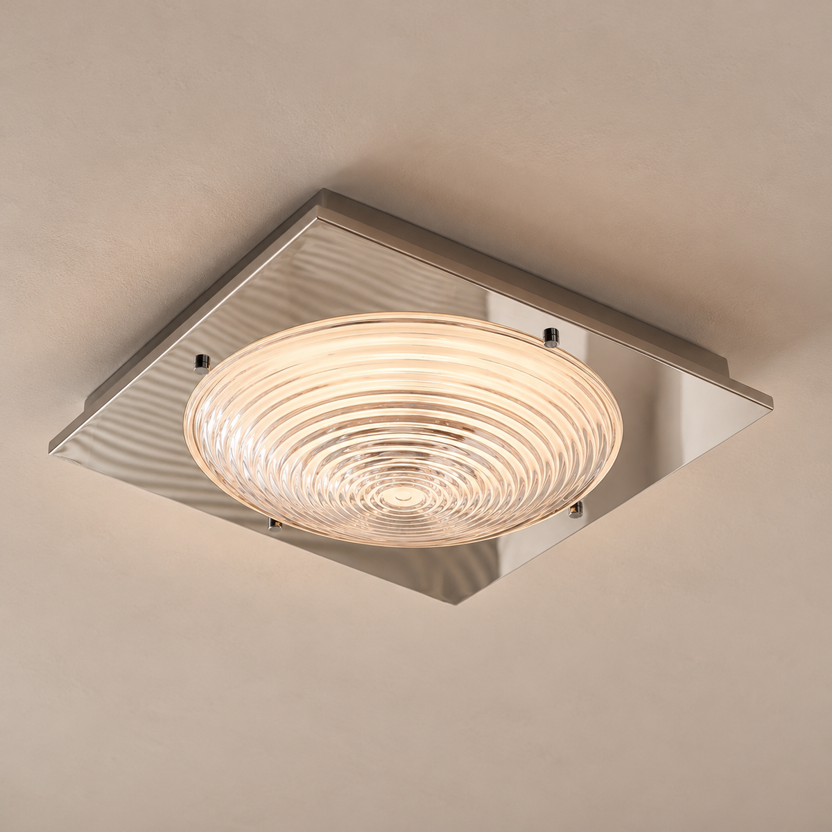 Concentric clear glass ceiling light with a square mirrored steel plate, illuminated
