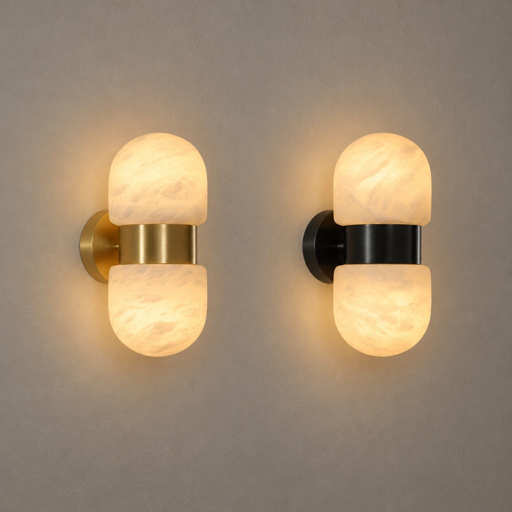 Alabaster Double Capsule Wall Sconce — Both natural copper and black with gold accents finishes on a warm neutral wall