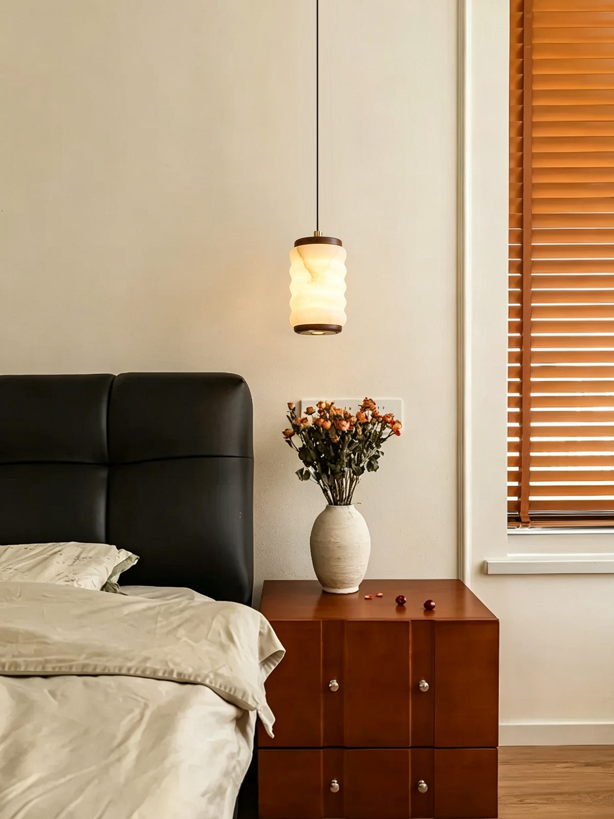 Ruvellune stone pendant at a bedside