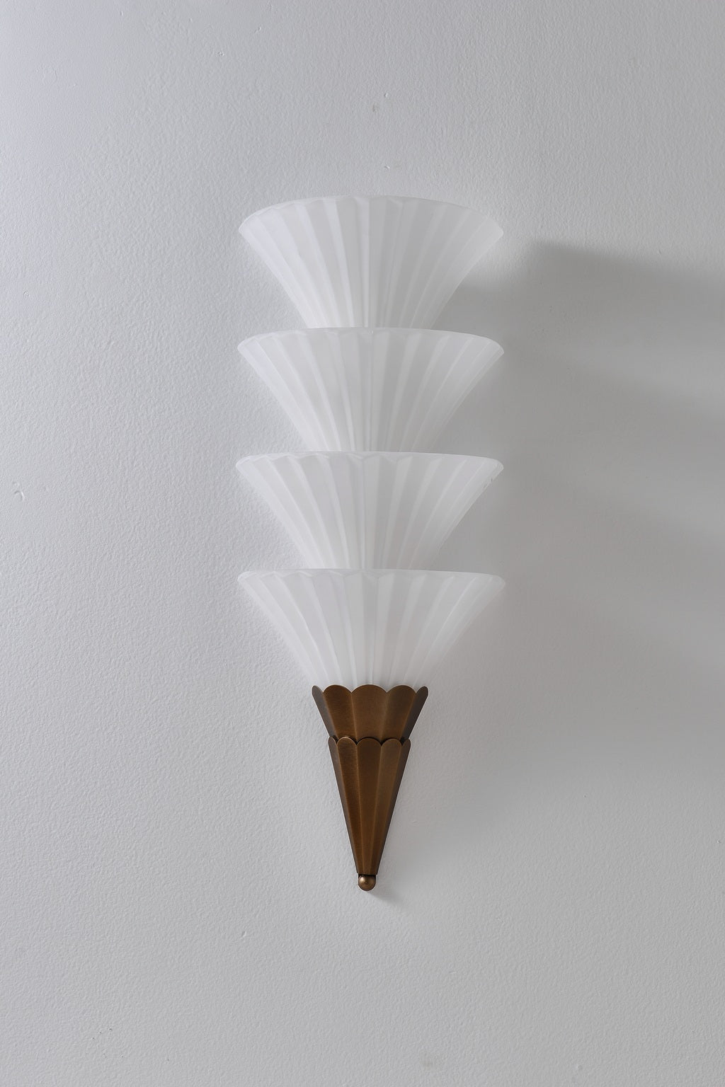 Fanelisse fluted glass wall sconce in Antique Bronze - Four-tier actual front view, unlit