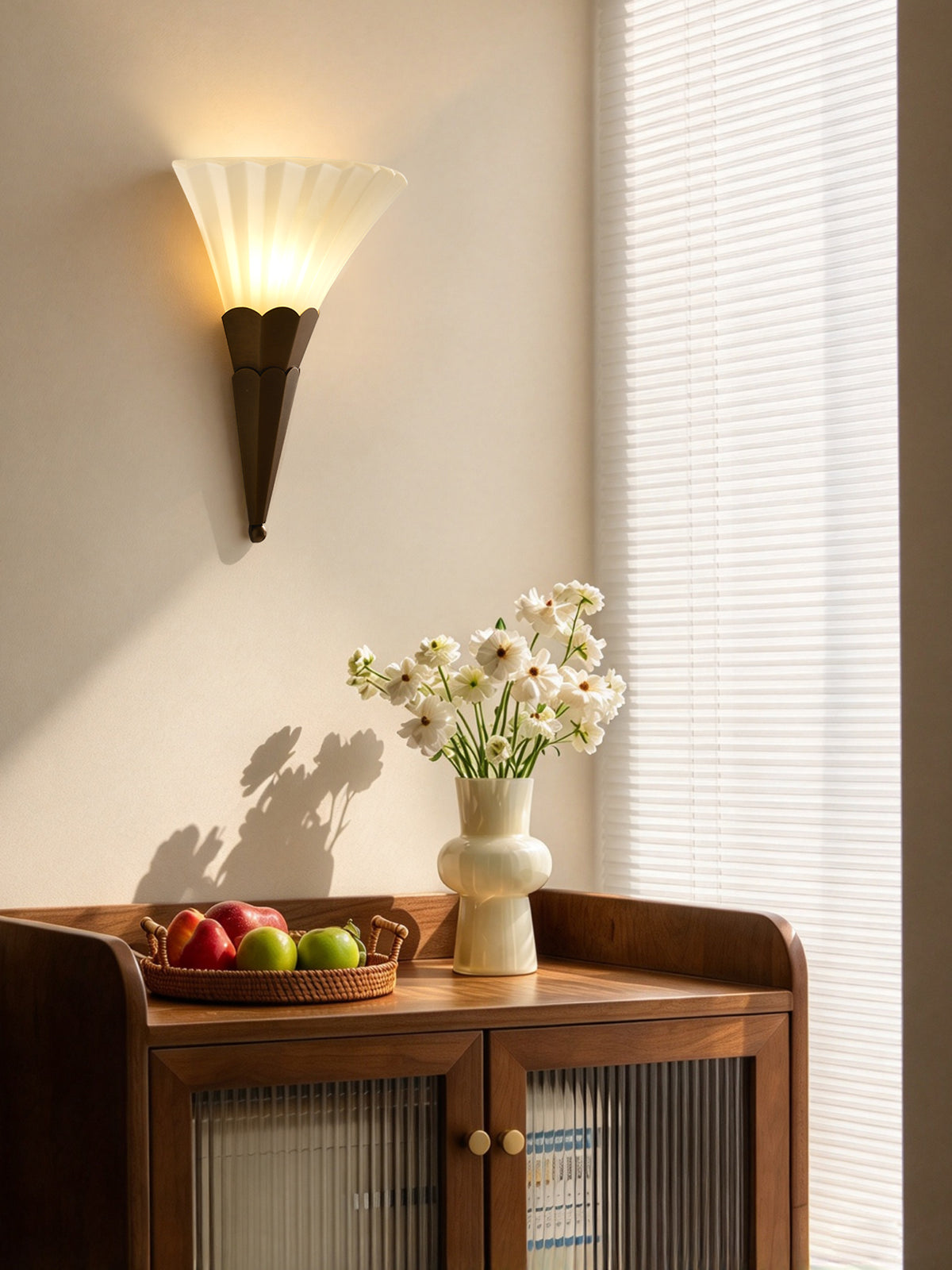 Fanelisse fluted glass wall sconce in Antique Bronze - One-tier original sideboard scene