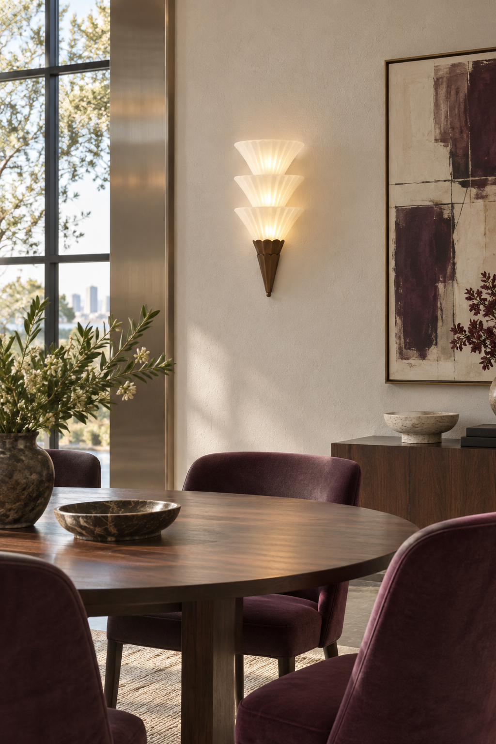 Fanelisse fluted glass wall sconce in Antique Bronze - Three-tier daylight dining room, warm light