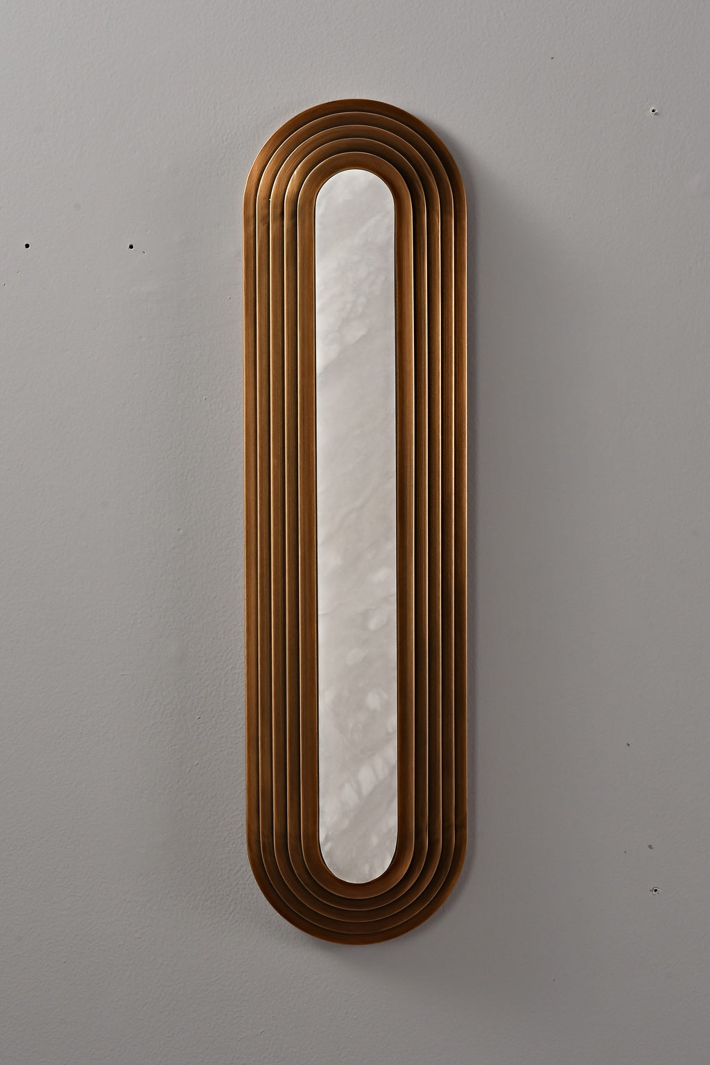Real photograph of the bronze-finish alabaster wall sconce switched off
