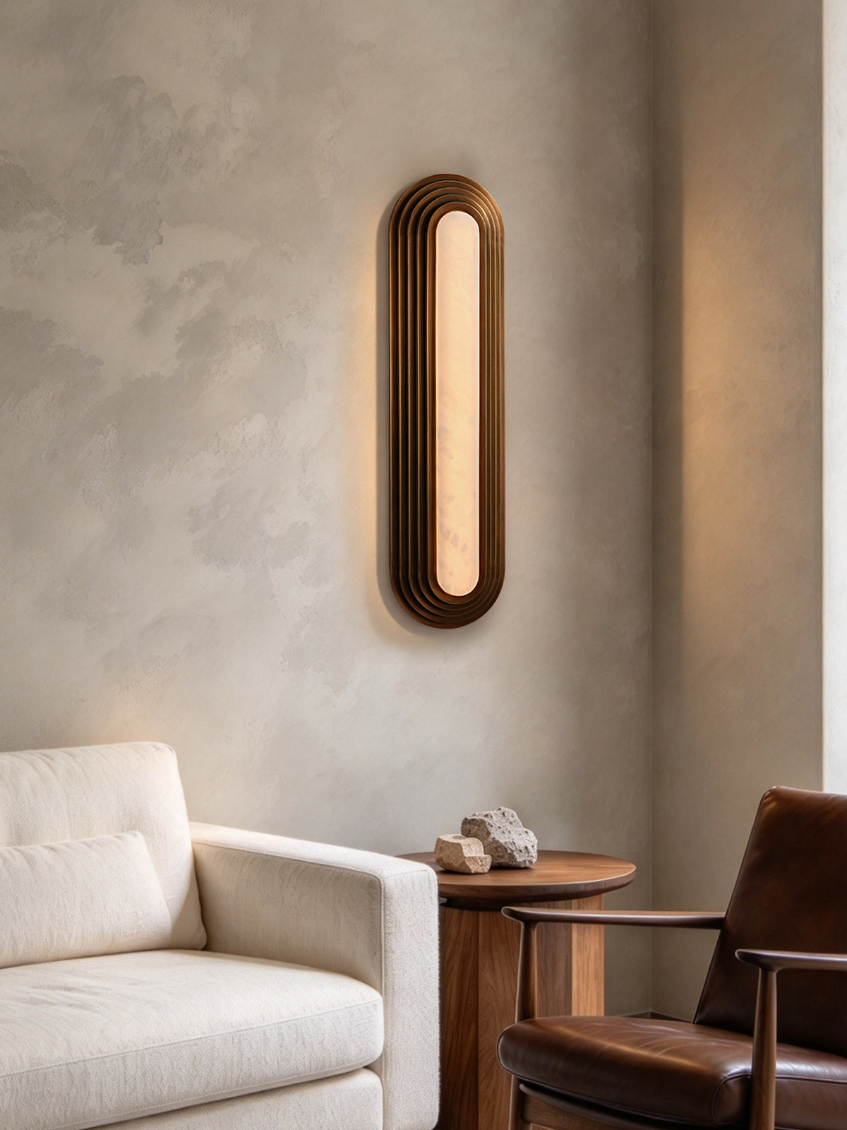 Original room photograph showing the stepped capsule alabaster wall sconce, view one