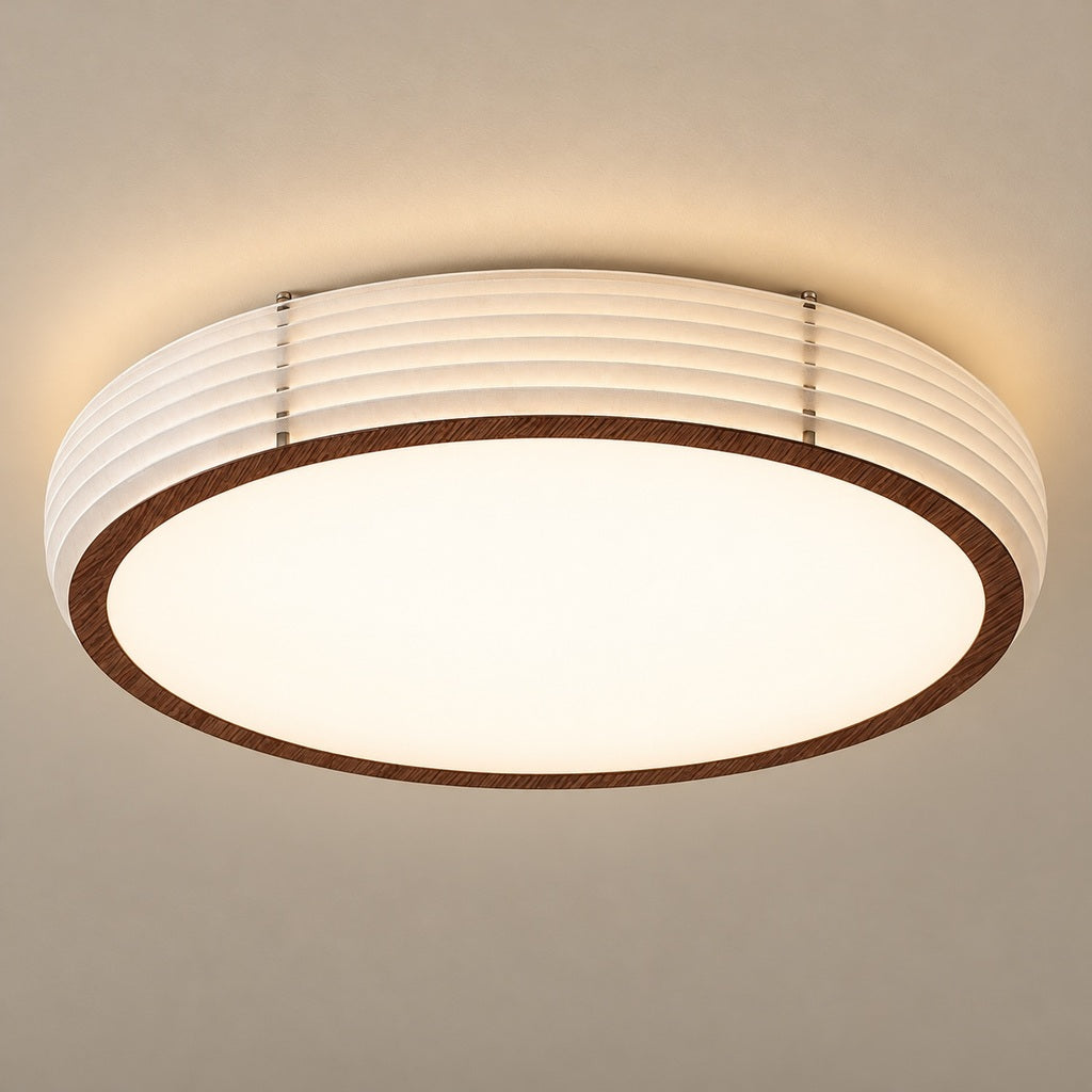 Woodgrain Ribbed Flush-Mount Ceiling Light — Large ribbed flush-mount ceiling light with wood-grain trim installed against a taupe ceiling